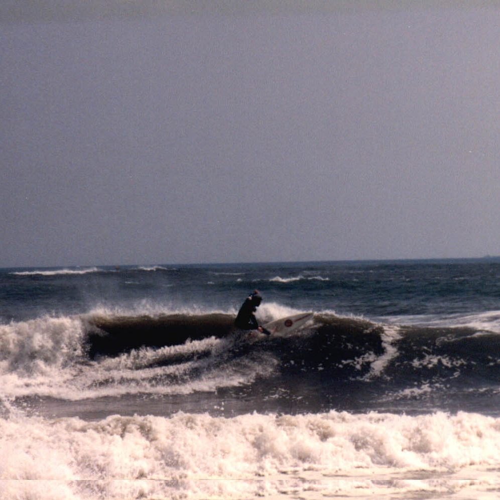 Francis Battaglia surfing at the jetty in Brigantine, NJ, 1989